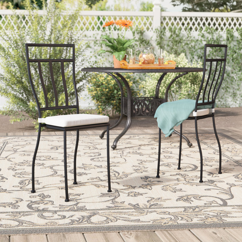 Three Posts Pittsford Stacking Patio Dining Chair with Cushion & Reviews Wayfair